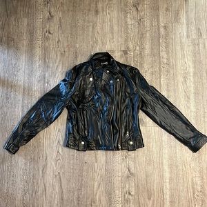 Leather jacket (juniors size) or small adult. Gently used.